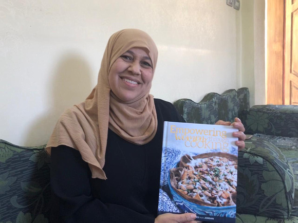 007 - JVL - Qalsoom with a Recipe Book that she Contributed